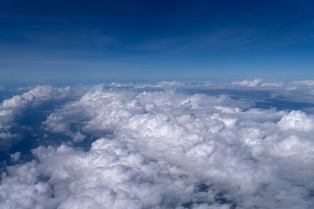 Beautiful aerial view above clouds, Airplane view.の写真素材