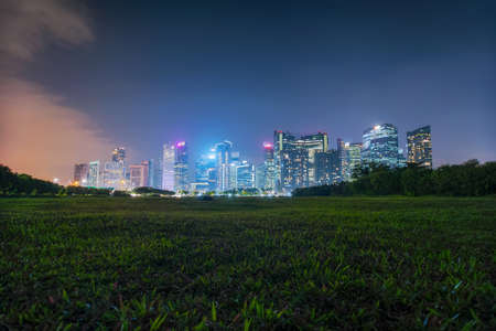 Twilight view of deserted park empty near Singapore downtown.の写真素材