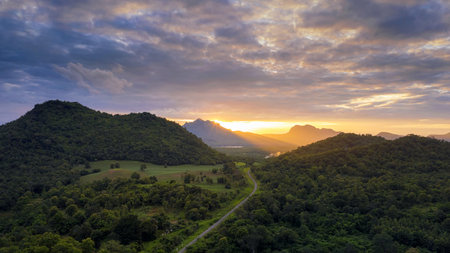 Beautiful Aerial view sunset over the mountain range at the north of thailand, Beauty green forest...