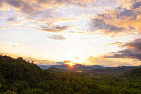 Scenic Sunset Landscape, Sun over Mountain at Mae Moh Lampang in thailand.の写真素材