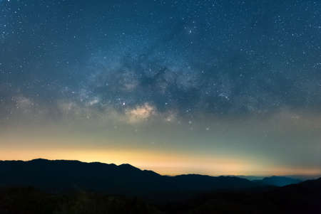 Milky way galaxy with stars and space dust in the universe, long speed exposure. Baan Na Sak, Mae Moh Lampang Thailand.の写真素材