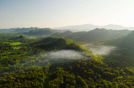 Aerial view Beautiful of morning scenery sea of cloud and the fog flows on high mountains.の写真素材