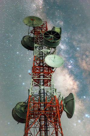Telecommunication station at night There is the Milky Way background, Transmission towers.の写真素材