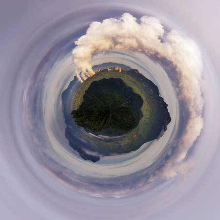 Little planet 360 degree sphere. Aerial view over coal-fired power plants in a large area The machine is working to generate electricity. Beautiful morning sky, Mae Moh, Lampang Province, Thailand.の写真素材