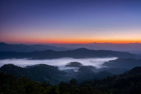 Aerial view Beautiful of morning scenery sea of cloud and the fog flows on high mountains. Doi Montngo, Mae Taeng, Chiang Mai. THailandの写真素材