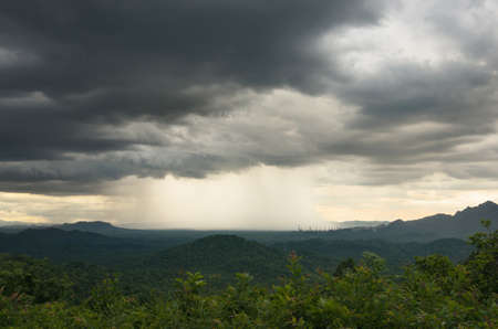 Nature environment Dark sky Big clouds Black moving storm clouds Thunderstorms on the horizon Time lapse Giant storms Fast moving Movie time Mea Mo, Lam pang Thailand.の写真素材