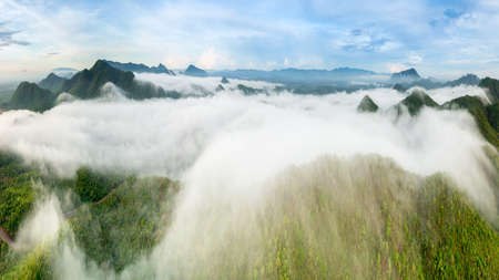 Beautiful aerial view sea of fog in the morning forest mountent with green mountains. Nong Ya Plong, Phetchaburi, Thailandの写真素材