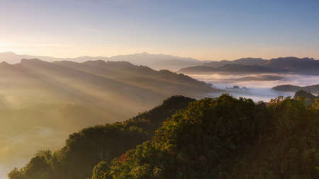 Beautiful panorama aerial view landscape sunbeam with fog at morning, Baan jabo viewpoint. Mae Hong Son, Baan JABO one of the most amazing Mist in Thailand.の写真素材