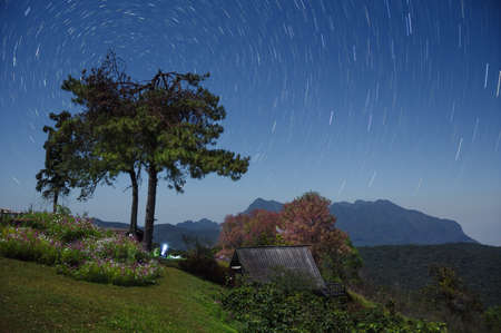 Beautiful Doi Luang Chiang Dao Mountains at night and star trails, Doi Mae Taman, San Pa Kia. Chiang Mai Province, Thailand.の写真素材