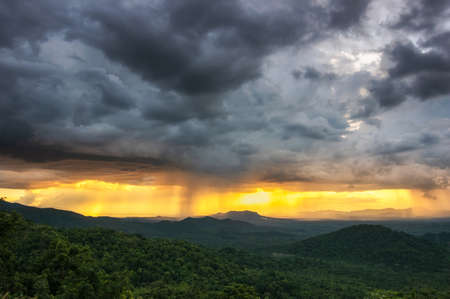 Aerial view rain storms and black clouds moving over the mountains In the north of Thailand, Pang Puey, Mae Moh, Lampang, Thailand.の写真素材