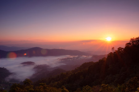 Aerial view Beautiful of morning scenery sea of cloud and the fog flows on high mountains. Doi Montngo, Mae Taeng, Chiang Mai. THailandの写真素材