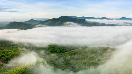 Beautiful aerial view sea of fog in the morning forest mountent with green mountains and road. Nong Ya Plong, Phetchaburi, Thailandの写真素材