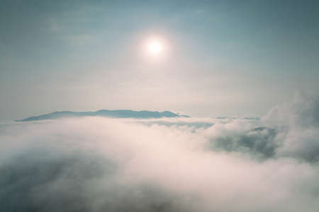 Fog in the morning forest with green mountains. Pang Puai, Mae Moh, Lampang, Thailand.の写真素材