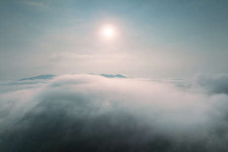 Fog in the morning forest with green mountains. Pang Puai, Mae Moh, Lampang, Thailand.の写真素材