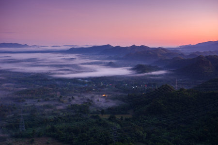 Beautiful scenery at sunrise with fog from the top of Doi Pha Phueng, Ban Pang Puai, Mae Moh,...