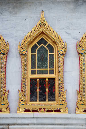 old window in templeの写真素材