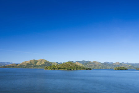 Lake Surrounded by Mountains and Forest