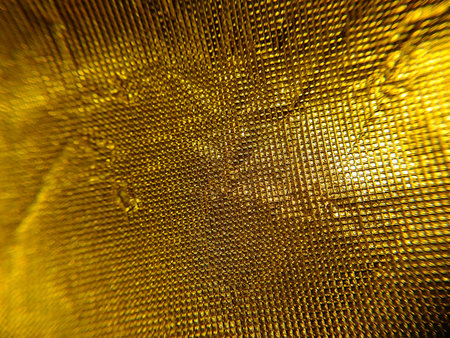 Close up Patterned Background golden , Macro photo , Selective focus , gold backgroundの写真素材