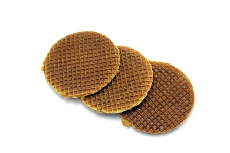 Syrup waffles, a real dutch delicacy, isolated on whiteの写真素材