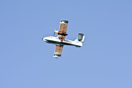 Fire fighting waterplane on his way to extinguish the forest fire 