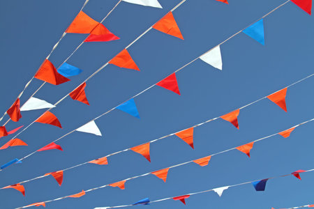 Orange, red, white and blue flags 