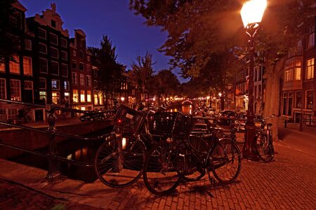 Amsterdam by night in the Netherlandsの写真素材