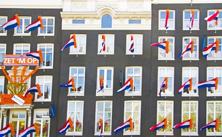 Decorated facades in Amsterdam the Netherlands on occasion of the coronation of the new king Willem Alexander from the Netherlands on 30 april 2013のeditorial素材