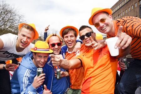 AMSTERDAM, NETHERLANDS - APRIL 30, 2013 : People in orange celebrating in Amsterdam during the coronation of the new king Willem Alexander from the Netherlands.のeditorial素材