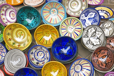 Colorful Tajines for sale in a market stallの写真素材