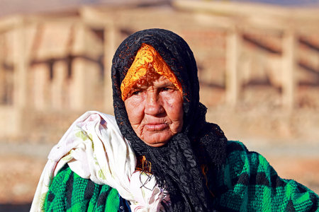 An old nomad woman in the desertのeditorial素材