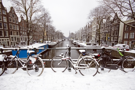 Amsterdam covered with snow  in winter in the Netherlandsの写真素材