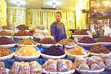 FES, MAROCCO - October 17 2013 : Merchant is selling dried fruits and nuts in the medina from Fes on october 17, 2013のeditorial素材