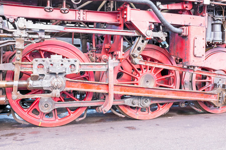 Close up from an antique steam locomotive in depotの写真素材
