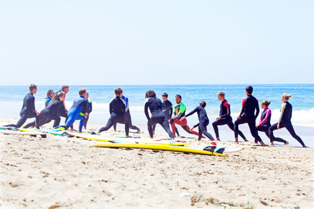 VALE FIGUEIRAS, PORTUGAL - August 20 2014: Surfers doing excersises on the famous surfers beach Vale...