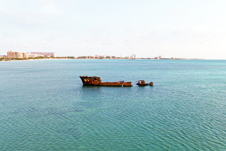 Ship wreck at the coast from Aruba island in the Caribbean Seaの写真素材