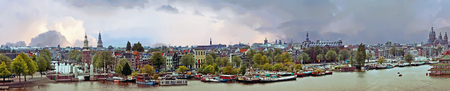 Panorama from the city Amsterdam in the Netherlands at sunsetの写真素材