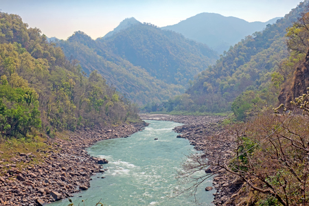 The holy river Ganges in India at Laxman Jhulaの写真素材