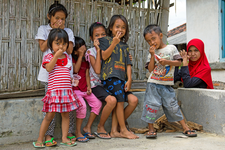LOMBOK, INDONESIA - DECEMBER 29, 2016: Indonesian kids in the streets in Lombok, Indonesia on the 29th of december 2016のeditorial素材