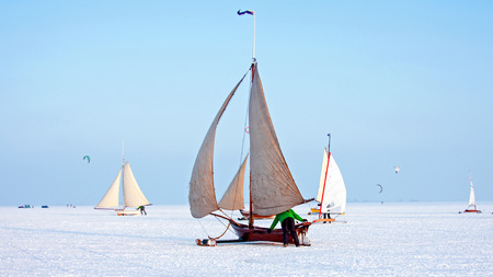 Ice sailing on a cold winter day on the Gouwzee in the Netherlandsの写真素材