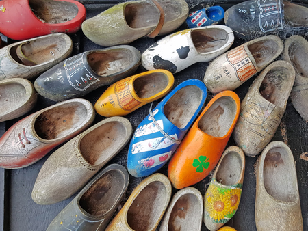 Traditional wooden shoes decorated with flowers in the Netherlandsの写真素材