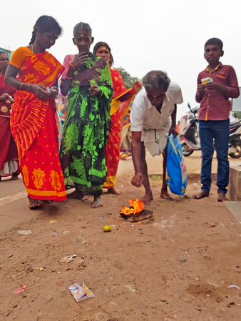 Tiruvanamalai, India - 16 december 2019: People doing puja on Vishnu day in the streets from Tiruvanamalai Indiaのeditorial素材