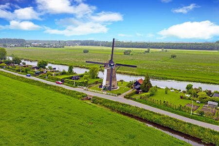 Aerial from a traditoinal windmill in the countryside from the Netherlandsの写真素材