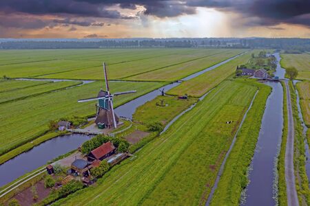 Aerial from a traditoinal windmill in the countryside from the Netherlandsの写真素材