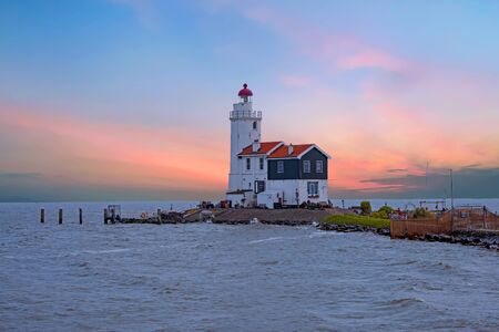 Traditional lighthouse 'Het Paard van Marken' in Marken the Netherlandsの写真素材