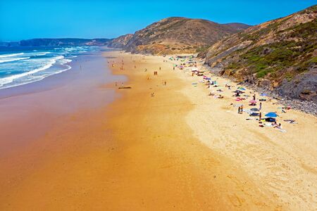 Aerial from Vale Figueiras beach on a beautiful summer day in Portugalの写真素材