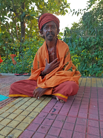 Tiruvanamalai, India - January 5, 2019: Sadhu in the streets from Tiruvanamalai in Tamil Nadu Indiaのeditorial素材
