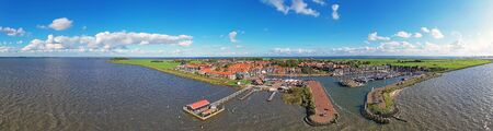 Aerial from the traditional village Marken at the IJsselmeer in the Netherlandsの写真素材