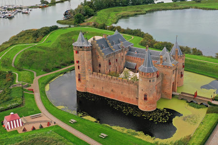Aerial from medieval castle 'Muiderslot' in the countryside from the Netherlands at sunsetのeditorial素材