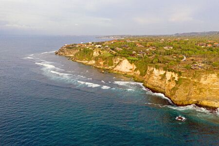 Aerial from a seascape on the west coast from Bali in Indonesiaの写真素材