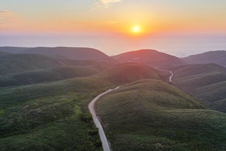 Aerial at the coast from Vale Figueiras in Portugal at sunsetの写真素材